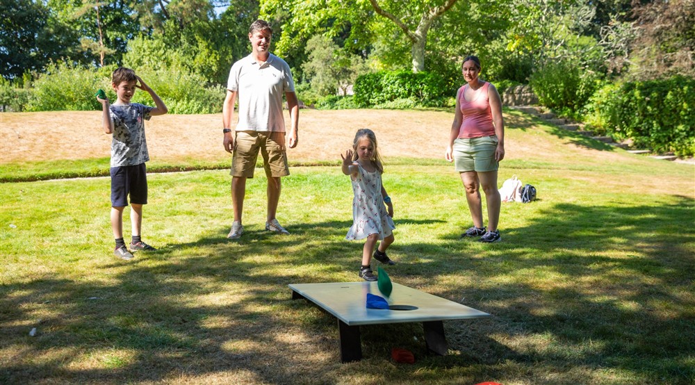 A family enjoying one of the summer play activities at Cotehele Engine Cottage in Calstock, Cornwall