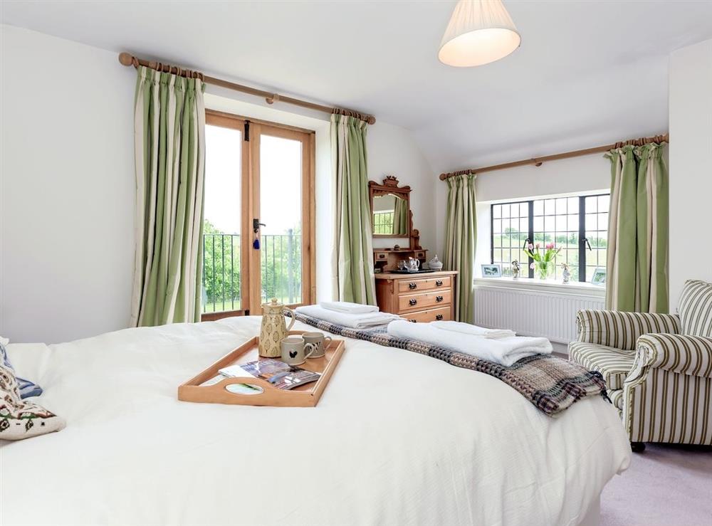 Double bedroom at Cotswold Farm in The Camp, near Stroud, Gloucestershire