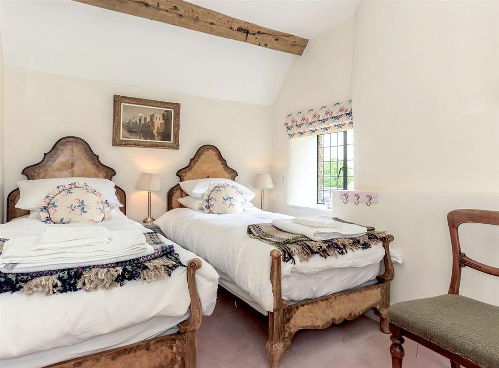 Twin bedroom at Cotswold Farm in The Camp, near Stroud, Gloucestershire