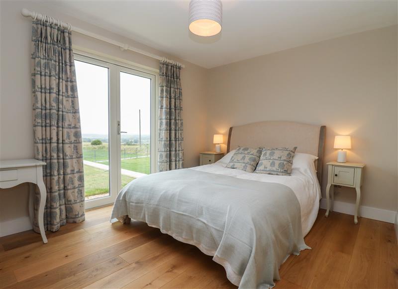 A bedroom in Cotswold View at Cotswold View, Langley Ridge Farm near Shipton under Wychwood