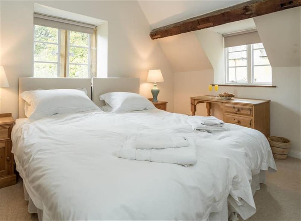 Twin bedroom at Cotswold Way Cottage in Wood Stanway, near Winchcombe, Gloucestershire