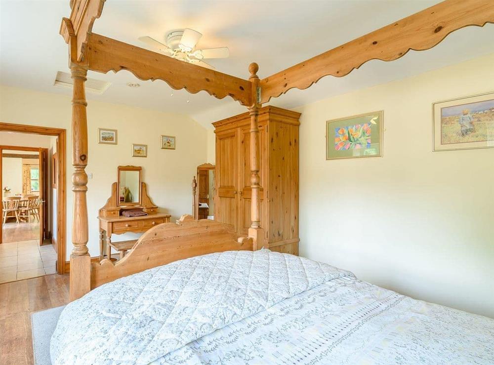Romantic four Poster bedroom (photo 2) at Cottage in the Pond in Garton, near Hornsea, North Humberside