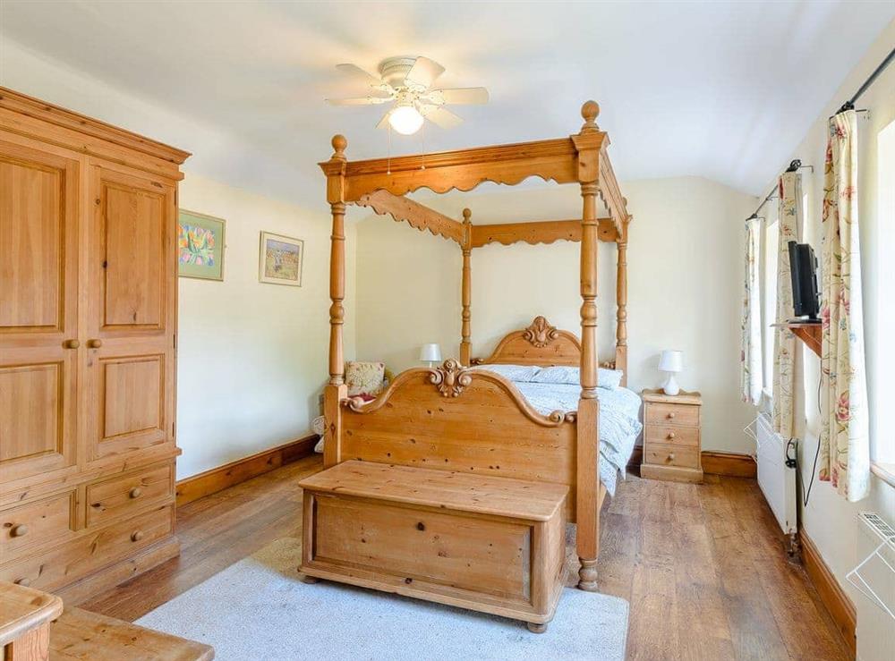 Romantic four Poster bedroom (photo 3) at Cottage in the Pond in Garton, near Hornsea, North Humberside