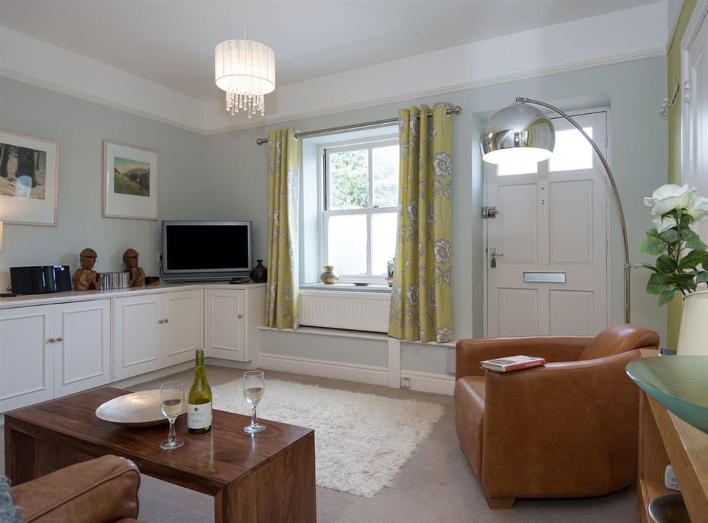 Cosy living room finished to a high standard at Cottage on the Green in Calne, Wiltshire