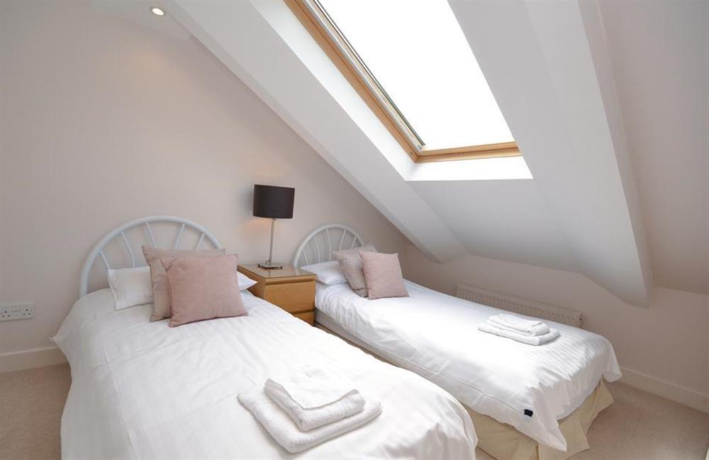 Small twin bedroom with sloped eaves, better suited for children or a single adult at Cotterbury, Dartmouth