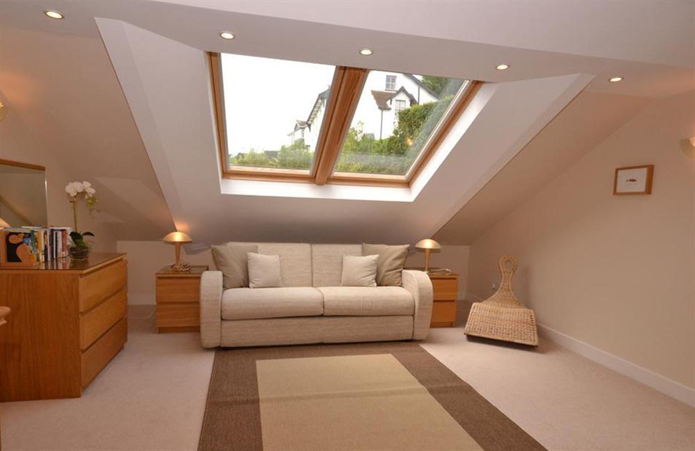 The rear section of the sitting room with generous sofa bed at Cotterbury, Dartmouth