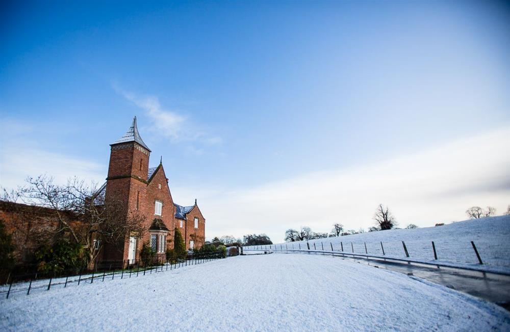 A beautiful wintery scene at Combermere Abbey at Cotton Cottage, Whitchurch