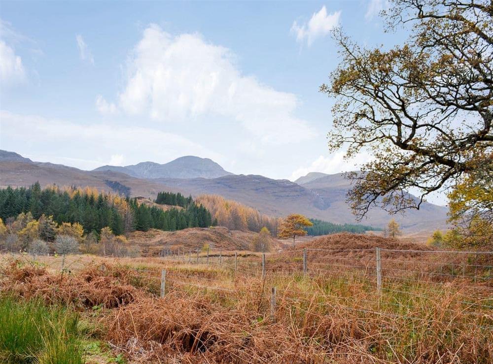 Set against dramatic mountainous scenery at Coulags Croft in Coulags, Strathcarron, Ross-shire., Ross-Shire