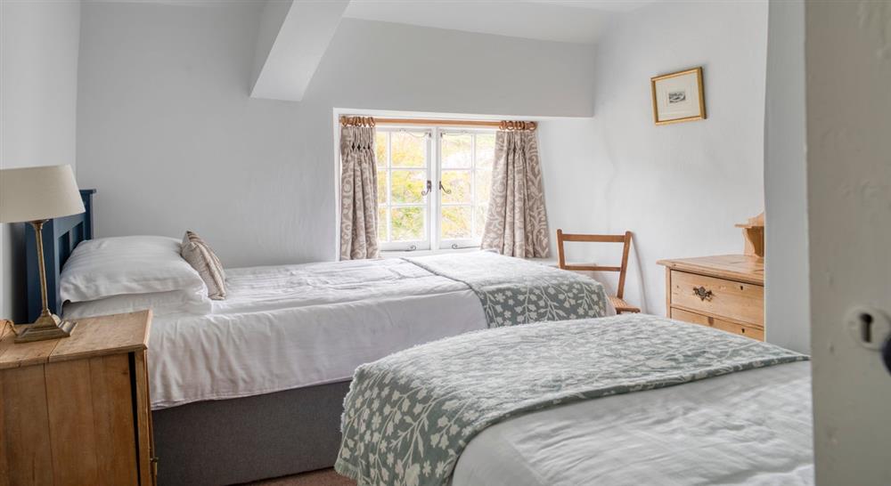 The twin bedroom at Countisbury Hill Cottage in Lynton, Devon