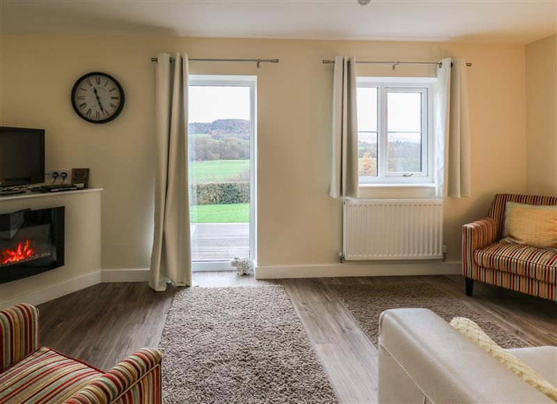 Relax in the living area at Country Cottage, Brecon
