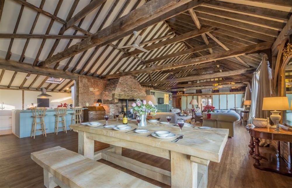 Open plan dining area with kitchen and seating area at Court Barn, Stoke By Nayland