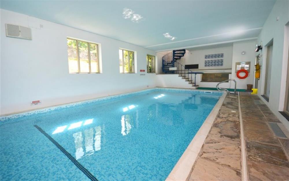 The indoor heated swimming pool. at Court Barton Cottage No. 1 in South Huish