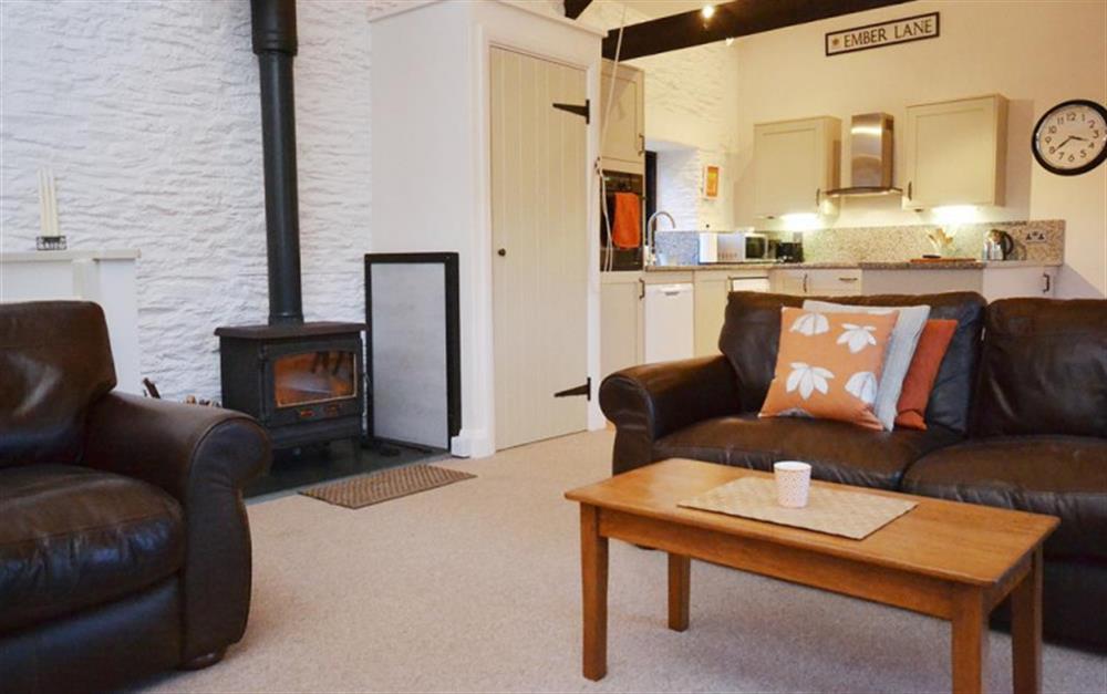 Another view of the living area showing the log burner at Court Barton Cottage No. 10 in South Huish