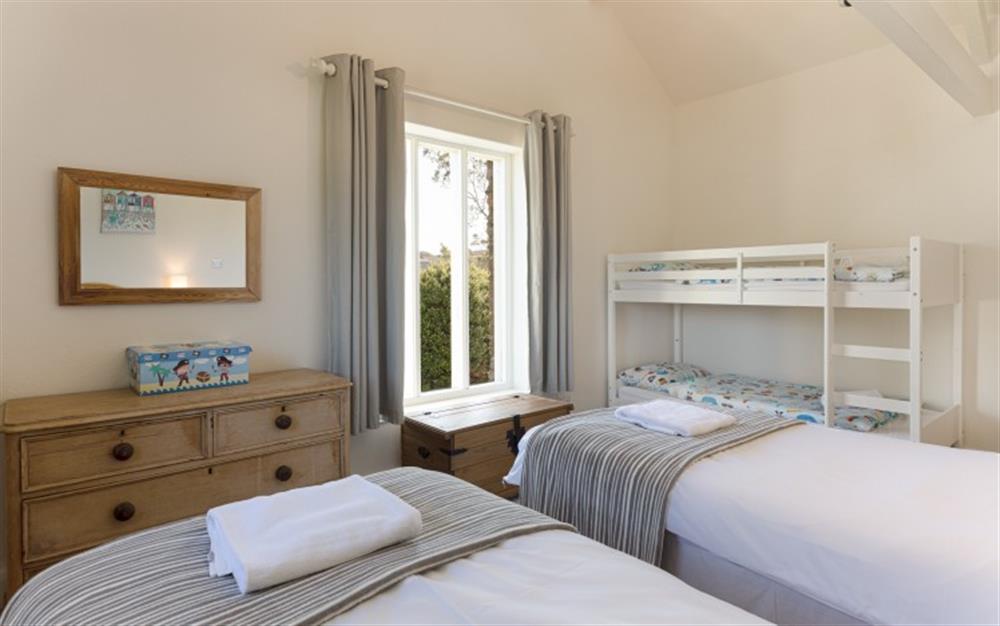 One of the bedrooms at Court Barton Cottage No. 11 in South Huish
