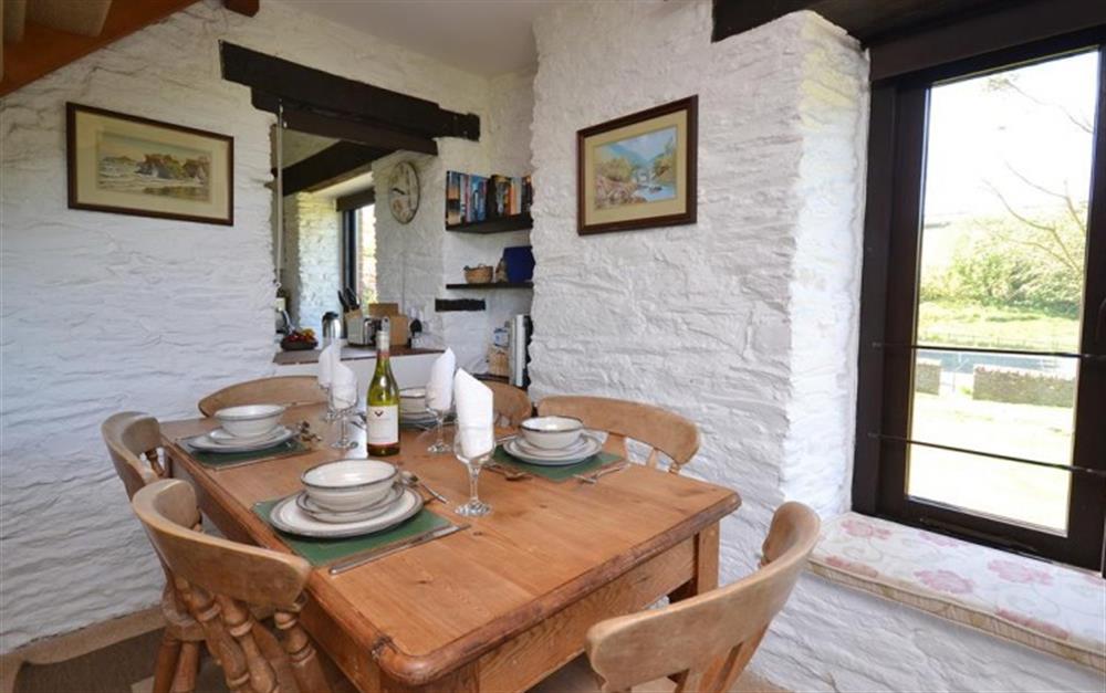 The dining area at Court Barton Cottage No. 2 in South Huish
