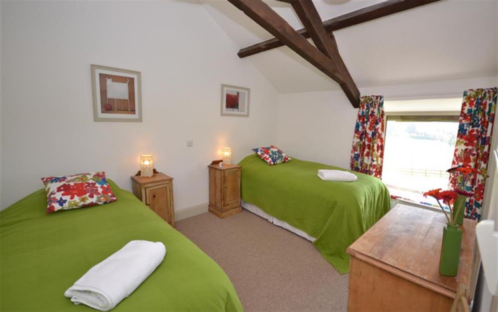 The twin bedroom. at Court Barton Cottage No. 3 in South Huish