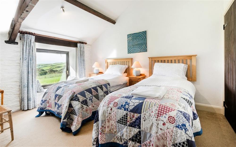 The pretty twin room at Court Barton Cottage No. 4 in South Huish