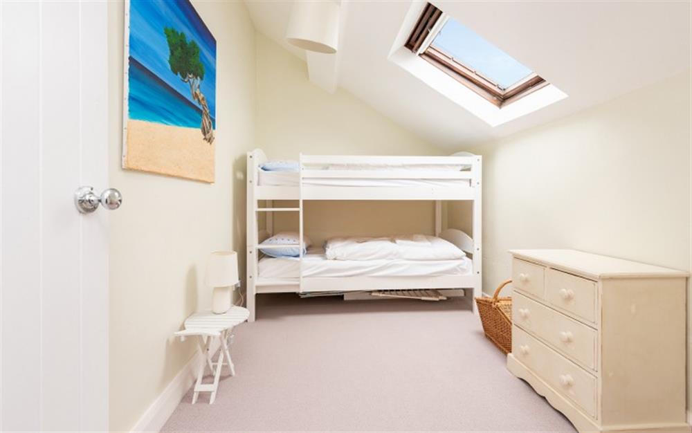 Bedroom 3 with bunk beds at Court Barton Cottage No. 8 in South Huish