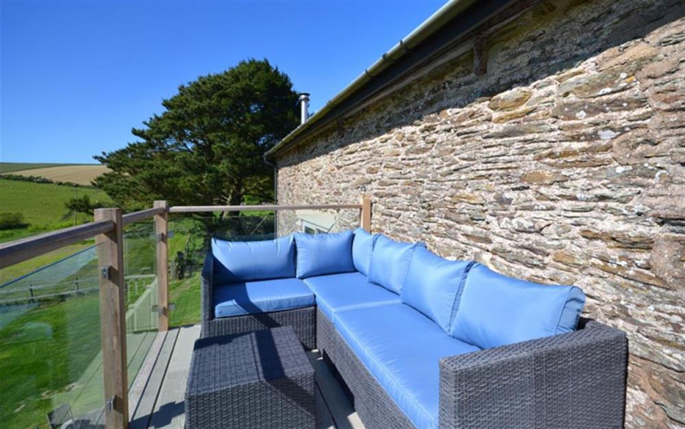 Comfortable seating on the balcony at Court Barton in South Huish