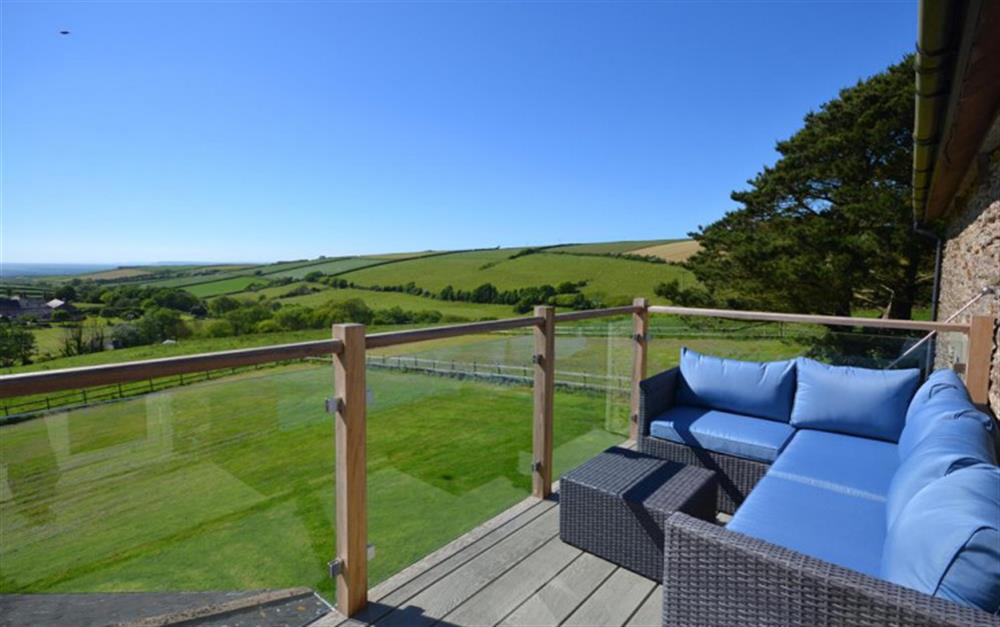 The balcony with stunning views at Court Barton in South Huish
