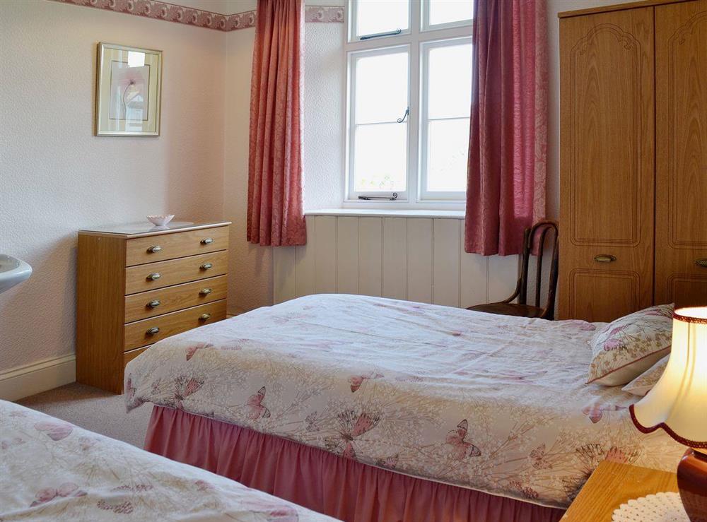 Twin bedroom at Court Place in Porlock, Somerset