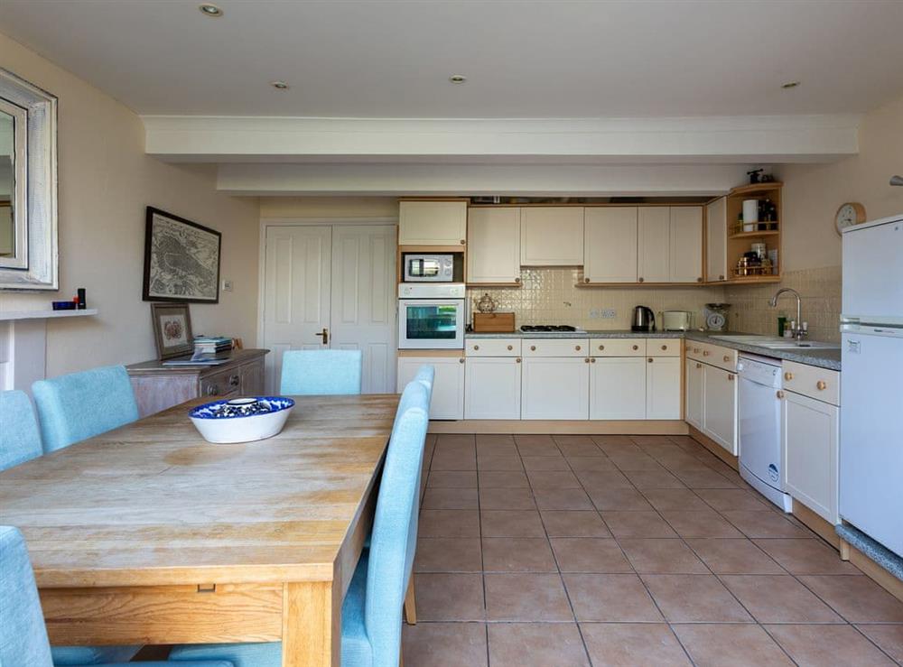Tile floored kitchen/diner with garden access at Courtenay Street 5 in Salcombe, Devon