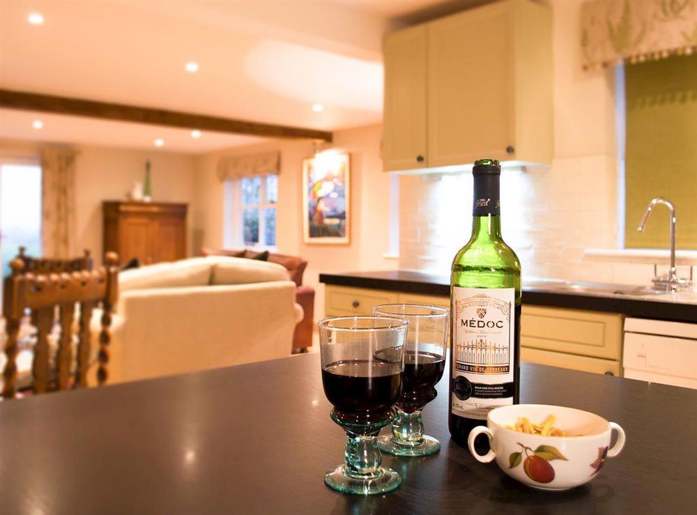 Fantastic kitchen with breakfast bar overlooking the living area at Courtside in Fairfield, near Appledore, Kent