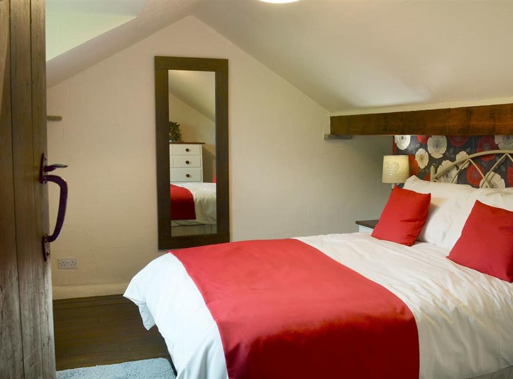 Charming double bedroom at Courtyard Cottage at Dam Hall Barn in Peak Forest, near Buxton, Derbyshire