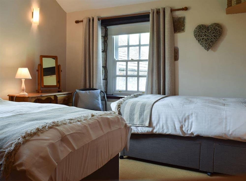 Twin bedroom at Courtyard Cottage in Cracoe, near Grassington, Yorkshire, North Yorkshire