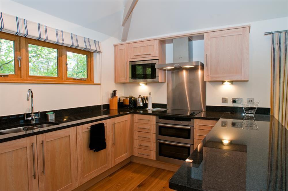 Beautifully designed and well equipped kitchen at Courtyard Cottage in , Dartmouth