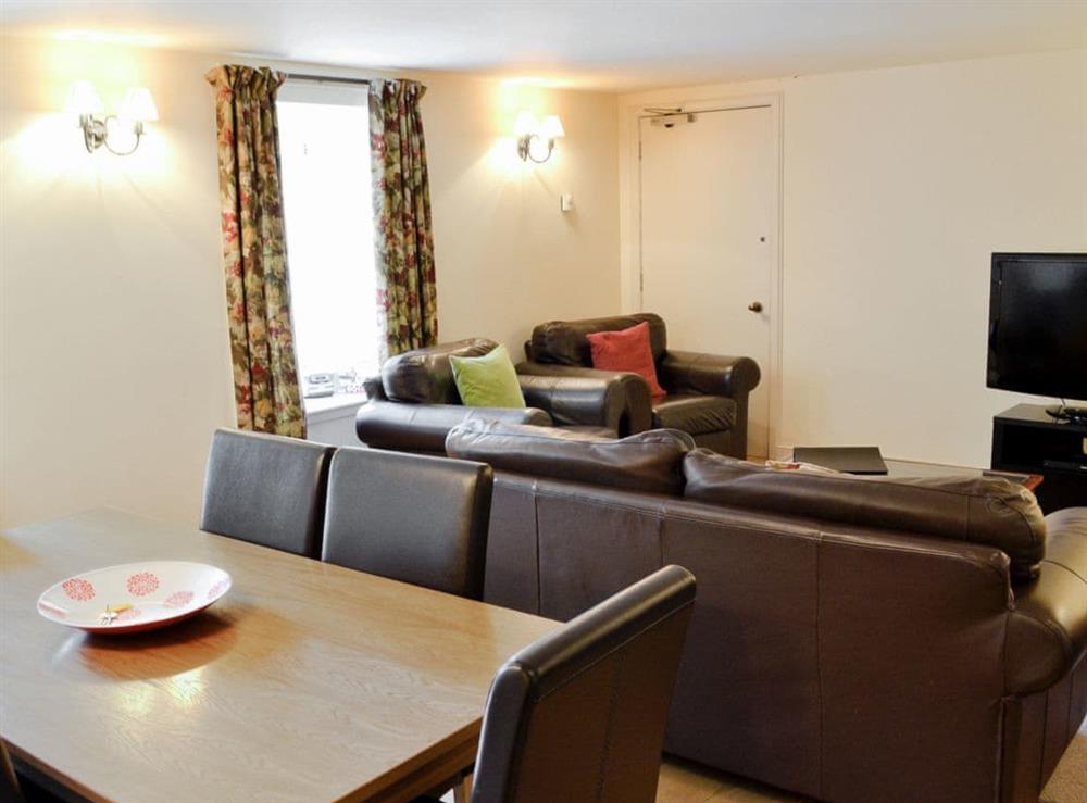Open plan living/dining room/kitchen (photo 2) at Courtyard Cottage in Gordon, Berwickshire