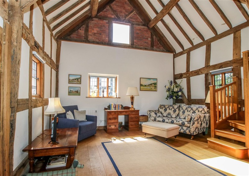 Relax in the living area at Courtyard Cottage, Little Stretton
