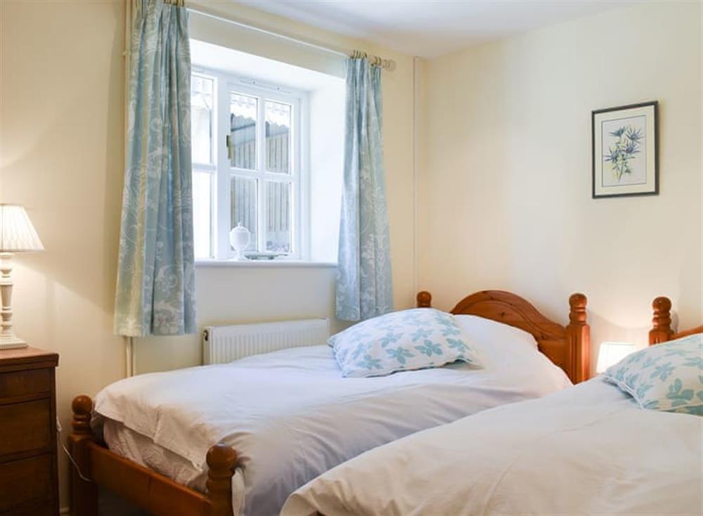 Twin bedroom at Courtyard Cottage in Owlpen, near Dursley, Gloucestershire