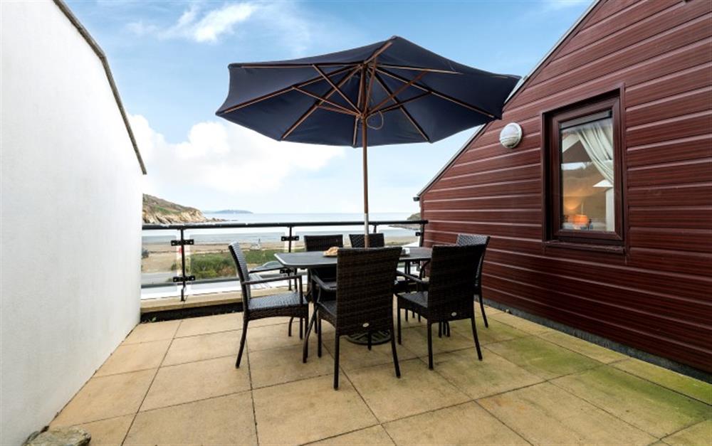 Enjoy some al fresco eating with a view to die for. at Cove 1 in Maenporth
