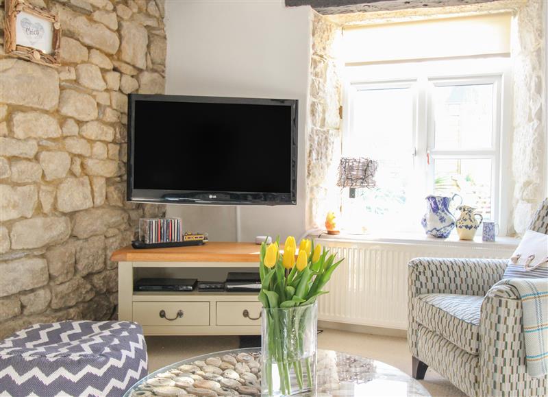 Relax in the living area at Cove Cottage Hideaway, Chiswell On Portland