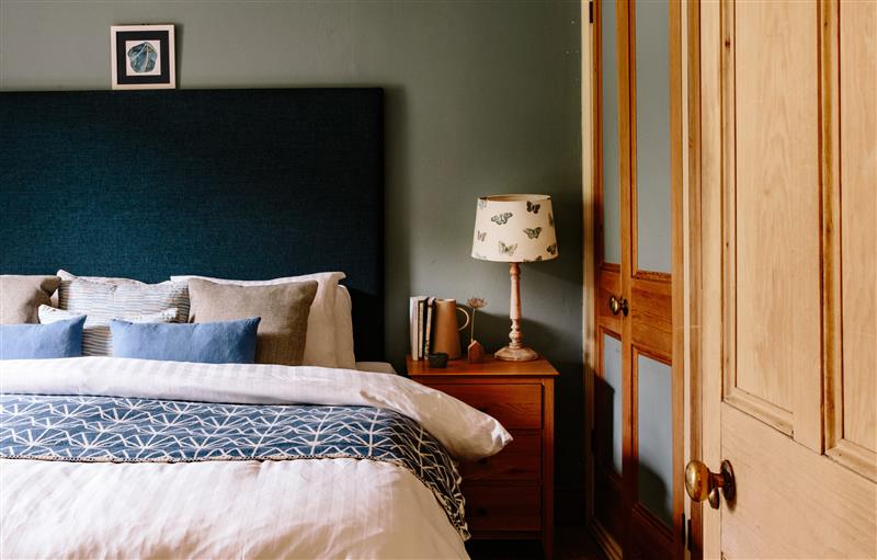 A bedroom in Cove Cottage at Cove Cottage, Porthgwarra