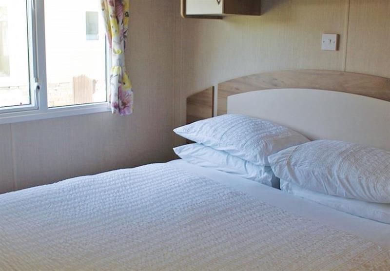 Double bedroom at Cove Holiday Park in Portland, Weymouth