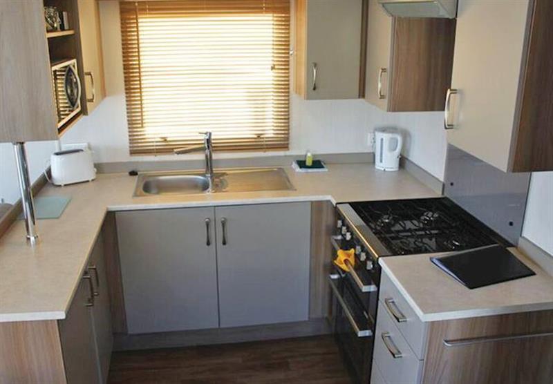 Kitchen at a Brightstone Seaview at Cove Holiday Park in Portland, Weymouth