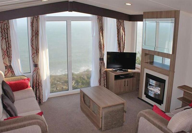 The living room in a Brightstone Seaview at Cove Holiday Park in Portland, Weymouth