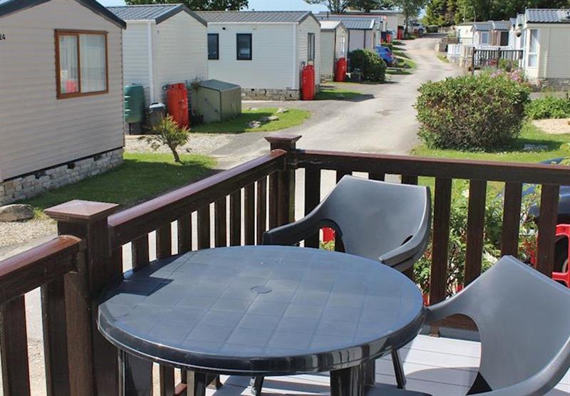 The veranda at a Brightstone at Cove Holiday Park in Portland, Weymouth