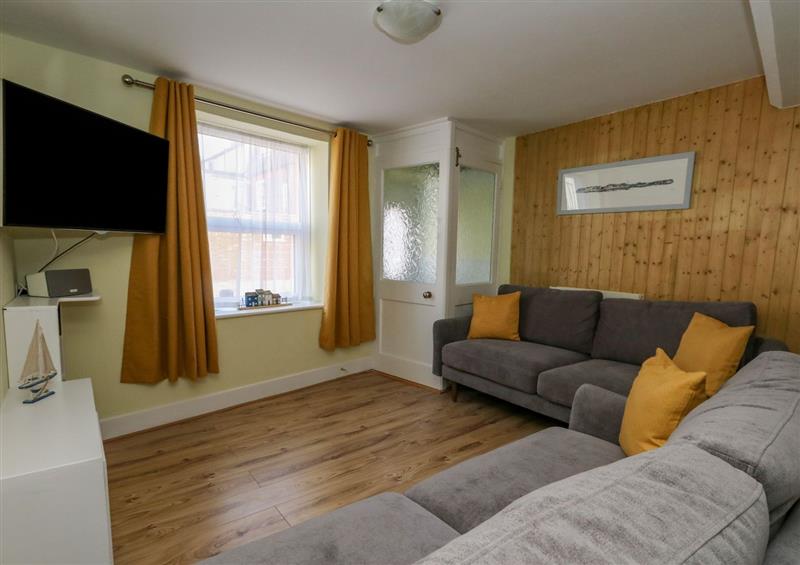 Relax in the living area at Cove Street Cottage, Weymouth