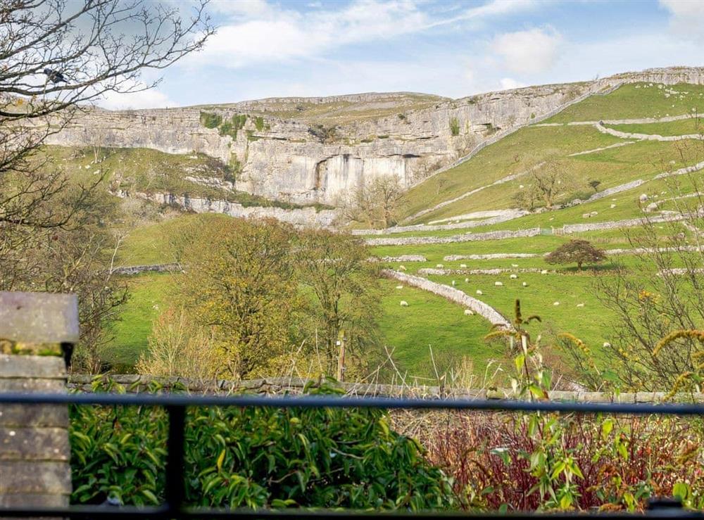 Majestic views of Malham Cove from the rear at Cove View Cottage in Malham, North Yorkshire