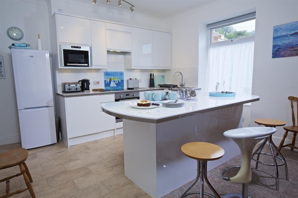 Newly refurbished kitchen with white gloss units at Cove View in , Hope Cove