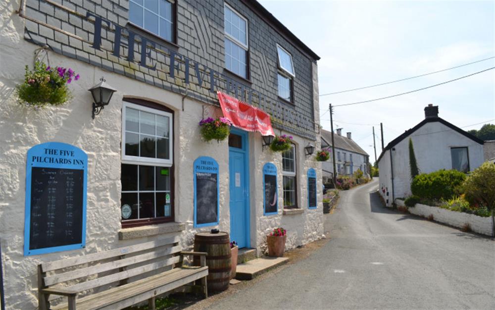 Enjoy a meal or a drink in the Five Pilchards in Porthallow.