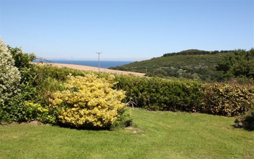 The large front garden is shared between the properties. You'll find lots of peaceful areas here to enjoy the view or lose yourself in a good book. at Cove View in Porthallow