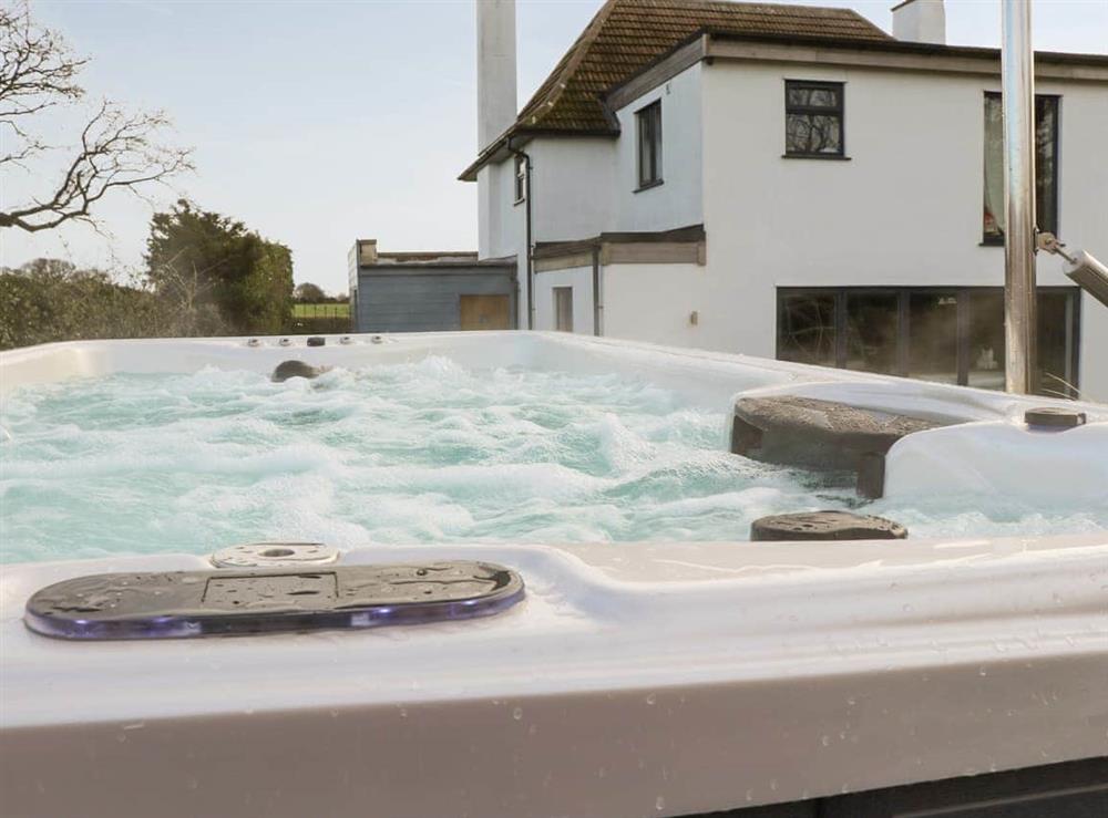 Huge swim spa, jacuzzi hot tub one end with pool the other at Covehithe House in Wrentham, Suffolk