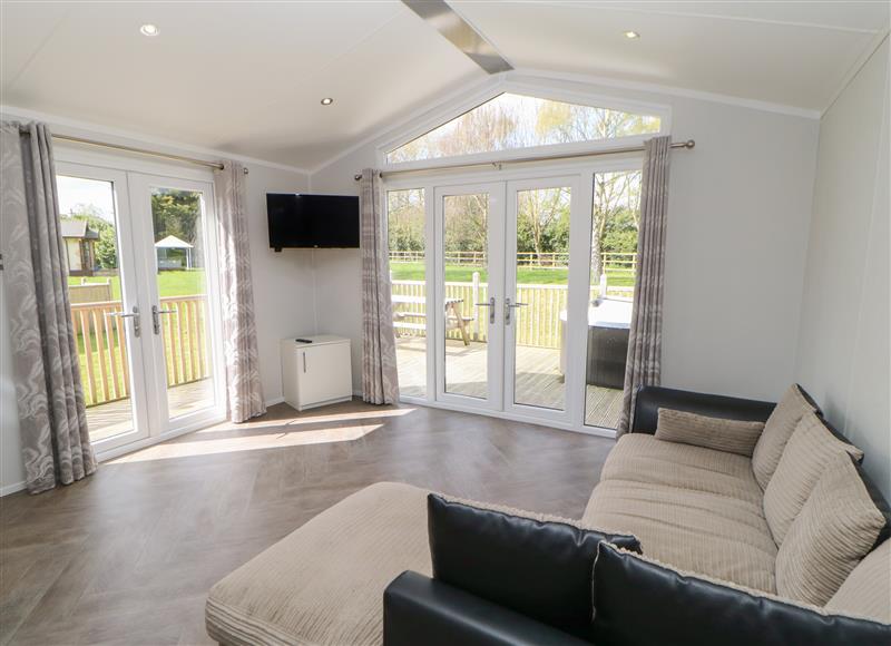 Relax in the living area at Coverdale Large Pod, Hutton Rudby
