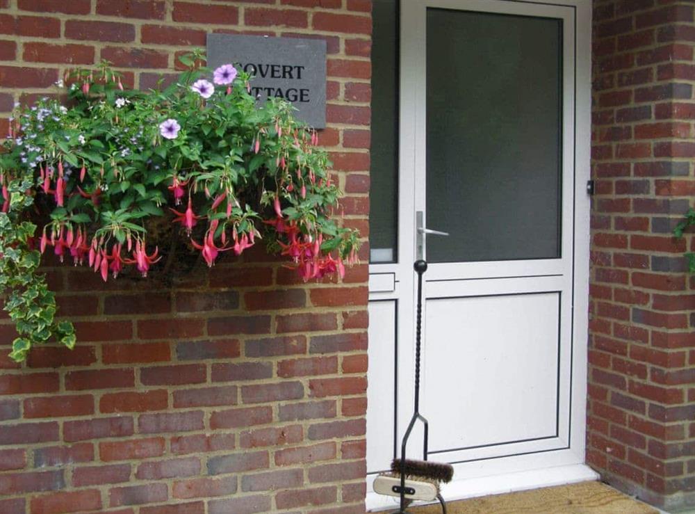 Florally decorated main entrance at Covert Cottage in Diss, Norfolk