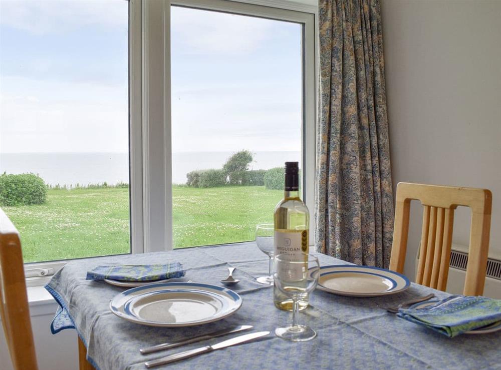 Dining area with sea views at Covesea Village in Covesea Duffus, near Lossiemouth, Moray, Morayshire