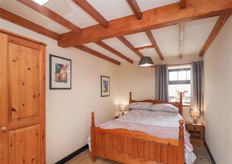A bedroom in Cow Byre Cottage at Cow Byre Cottage, Whitby